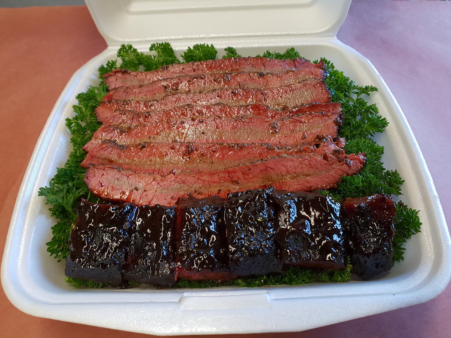 Picture of Brisket smoked in a charcoal Meat smoker at a BBQ Competition in Australia. A BBQ Smoker is widely used in competitions and as it is the best way to cook brisket and achieve results like in this photo