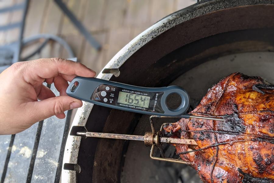 The image shows how to use a Slow n Sear Cooking Thermometer
