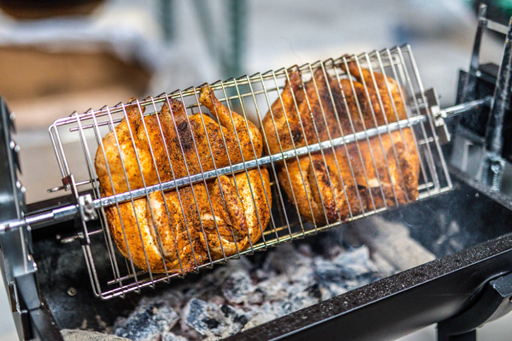 Whole chickens cook on Mini Spit