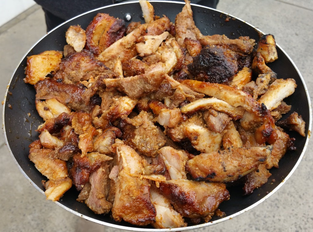 Freshly carved Gyros on a BBQ Spit