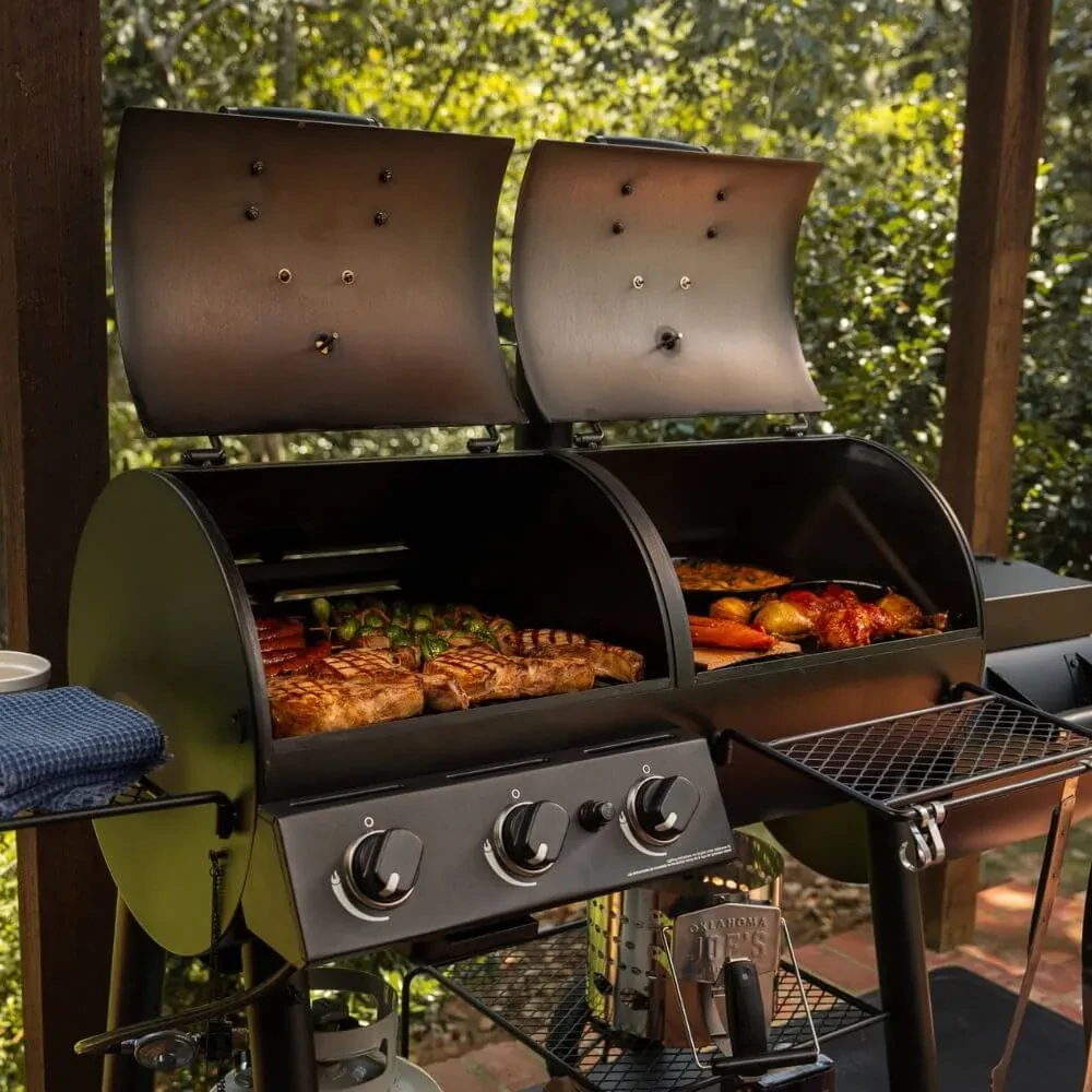 Oklahoma Joe's Canyon Combo charcoal and gas smoker grill cooking steaks chicken and vegetables