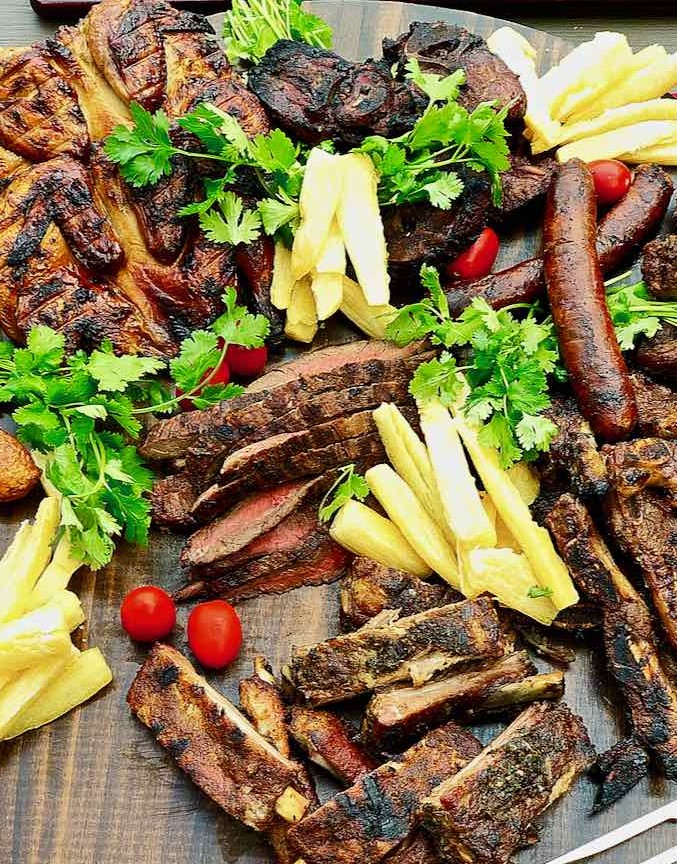 This is an image of an asado bbq that was cooked on a parilla grill