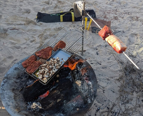 This_image_shows_meat_being_cooked_using_Auspit_rotisserie_camping_spit