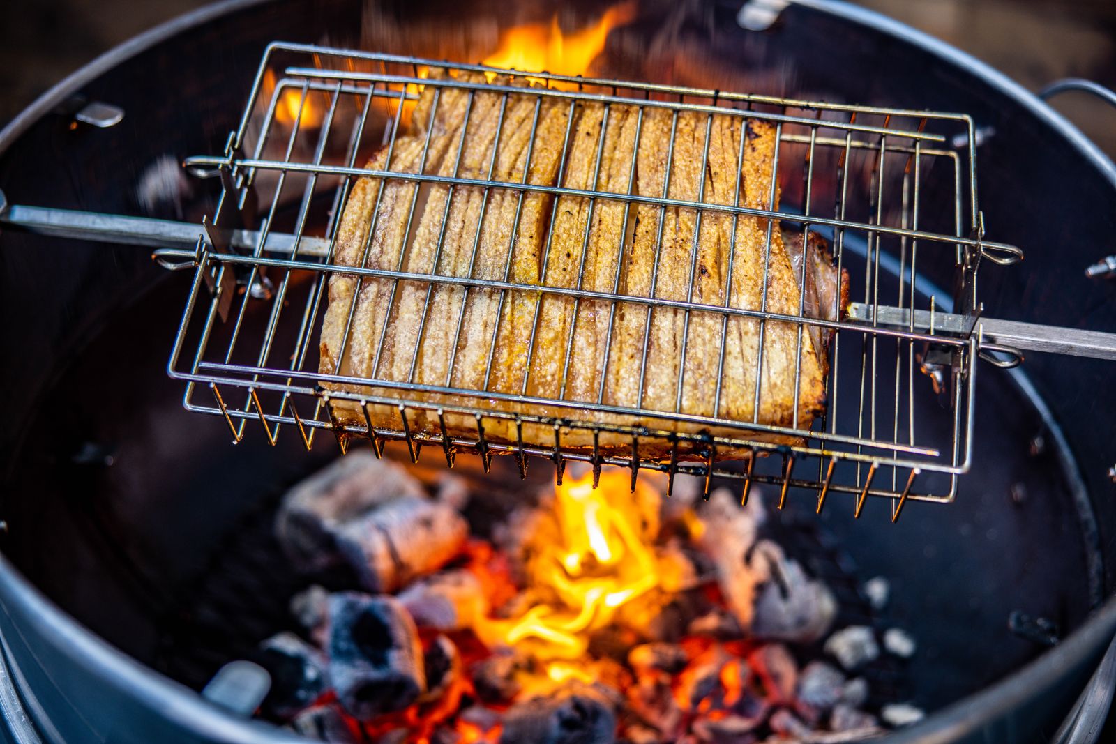 This_image_shows_a_Pork_Belly_cooked_on_a_Kettle_Rotisserie
