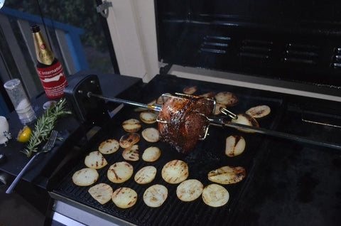 This_is_a_picture_of_roast_beef_being_cooked_on_a_rotisserie_kit_on_a_gas_BBQ