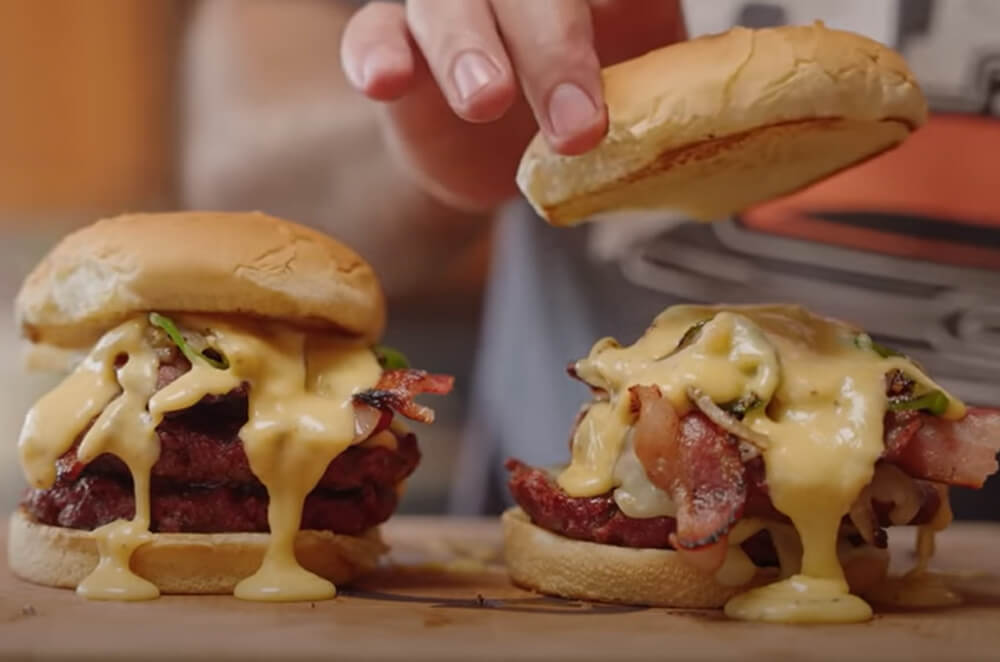 This image shows Delicious Burgers with smoked beer and Bacon