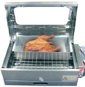Image of a chicken being roasted the the Sizzler baking tray dish