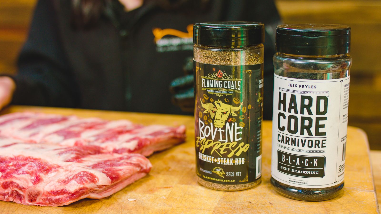 This image shows beef ribs, Flaming Coals Bovine Espresso and Hardcore Carnivore Rub