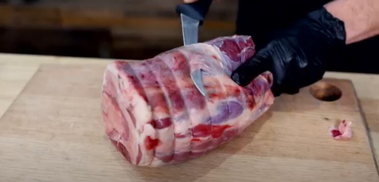 This photo shows how to remove excess skin on a beef