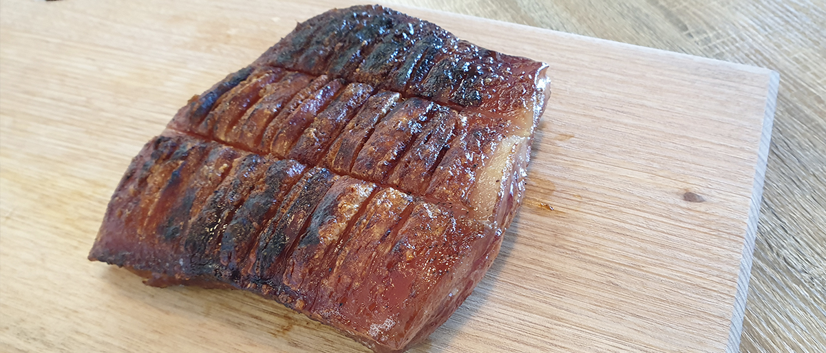 This picture shows the pork Belly with crackling after it is cooked