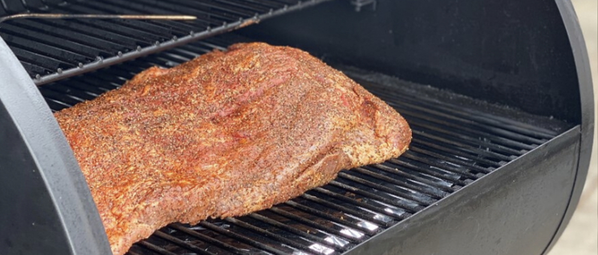 This is an image of a brisket cooked in a pellet smoker