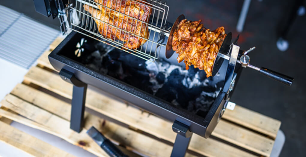 This image image shows Butterflied Chicken cooked in Jumbuck Mini Spit Roaster