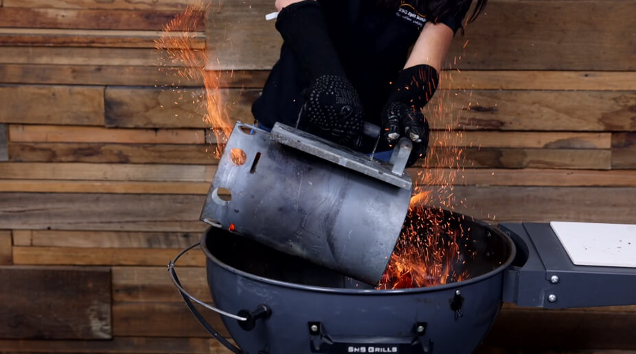 This_image_shows_Charcoal_chimney_with_lit_charcoal_heat_proof_gloves