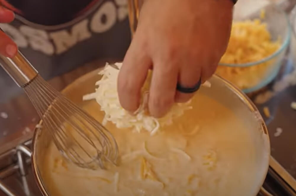 This image shows cheese mixture being cooked for the pasta