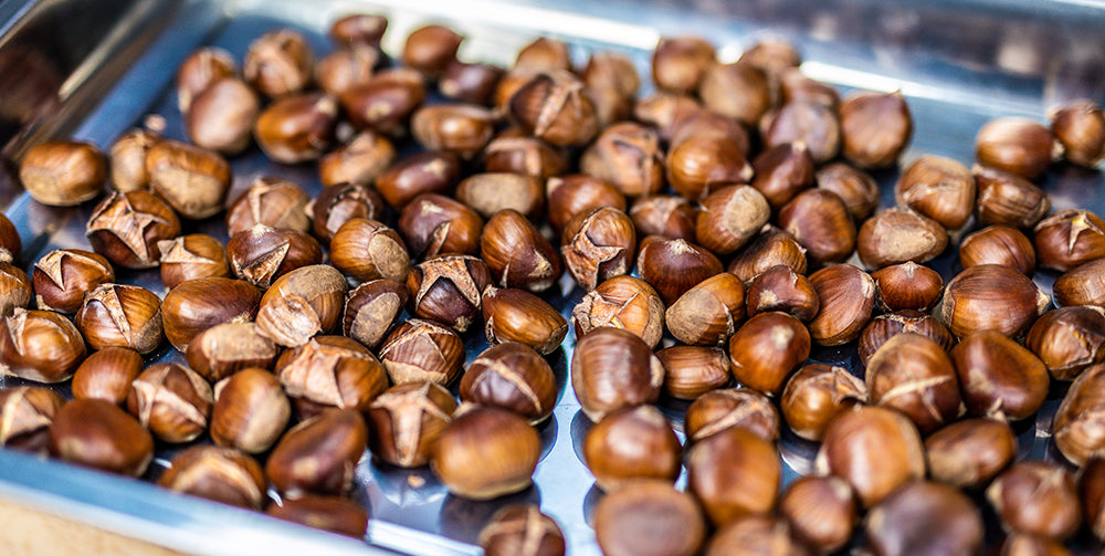 This image shows chestnuts being removed in the fire