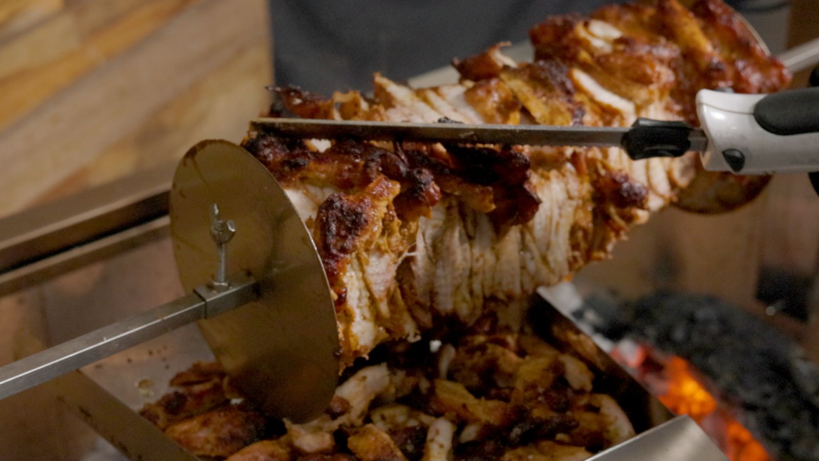 This_image_shows_carving_the_Chicken_Gyros
