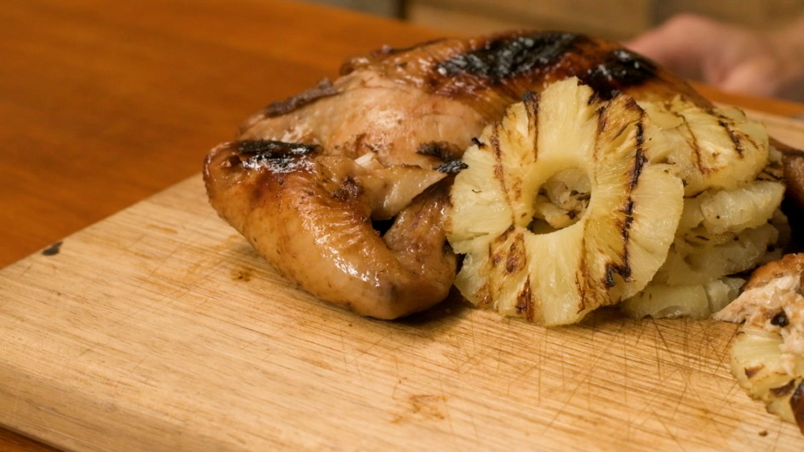 This_image_shows_zesty_butterflied_chicken_with_grilled_pineapple