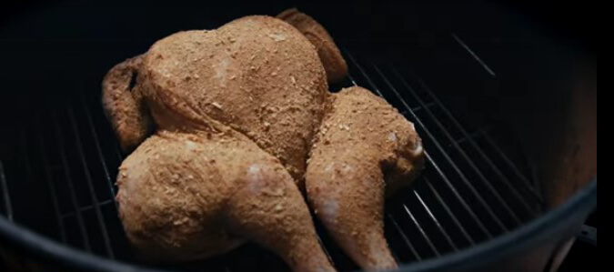 This photo shows a Whole Chicken on a Pit barrel