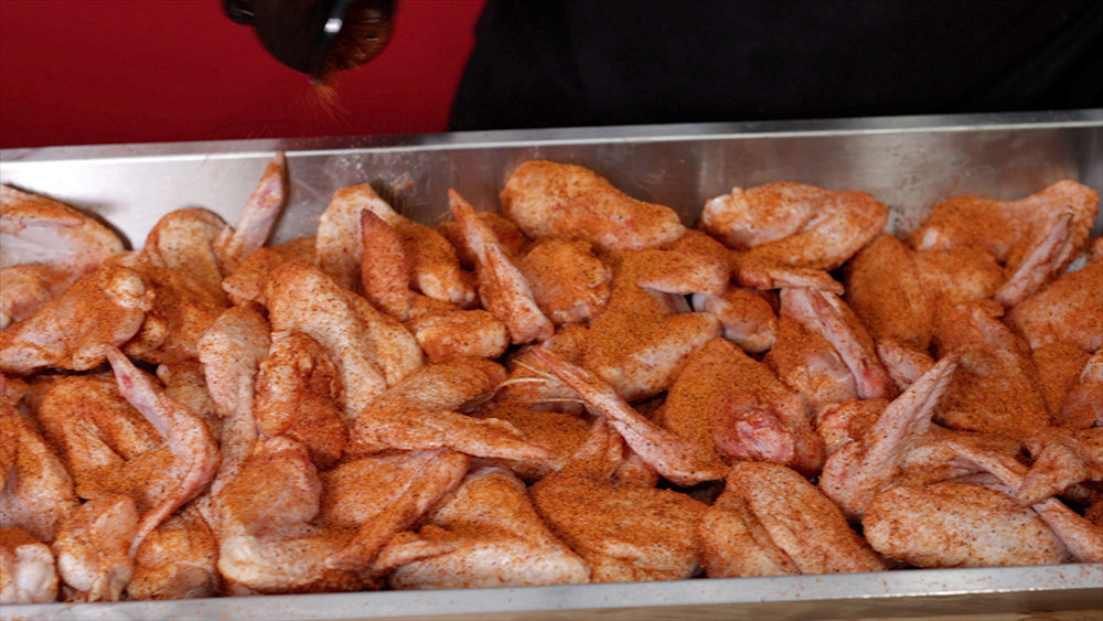 This image shows chicken wings in a tray