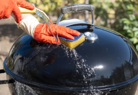 This_image_shows_cleaning_the_exterior_of_bbq