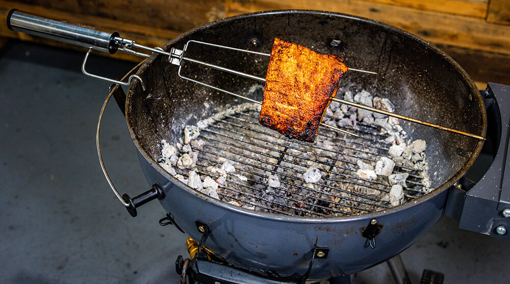 This_image_shows_pork_belly_being_cooked_in_espetosul_rotisserie