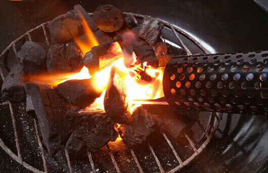 This image shows Charcoal Starter Wand and lit Charcoal