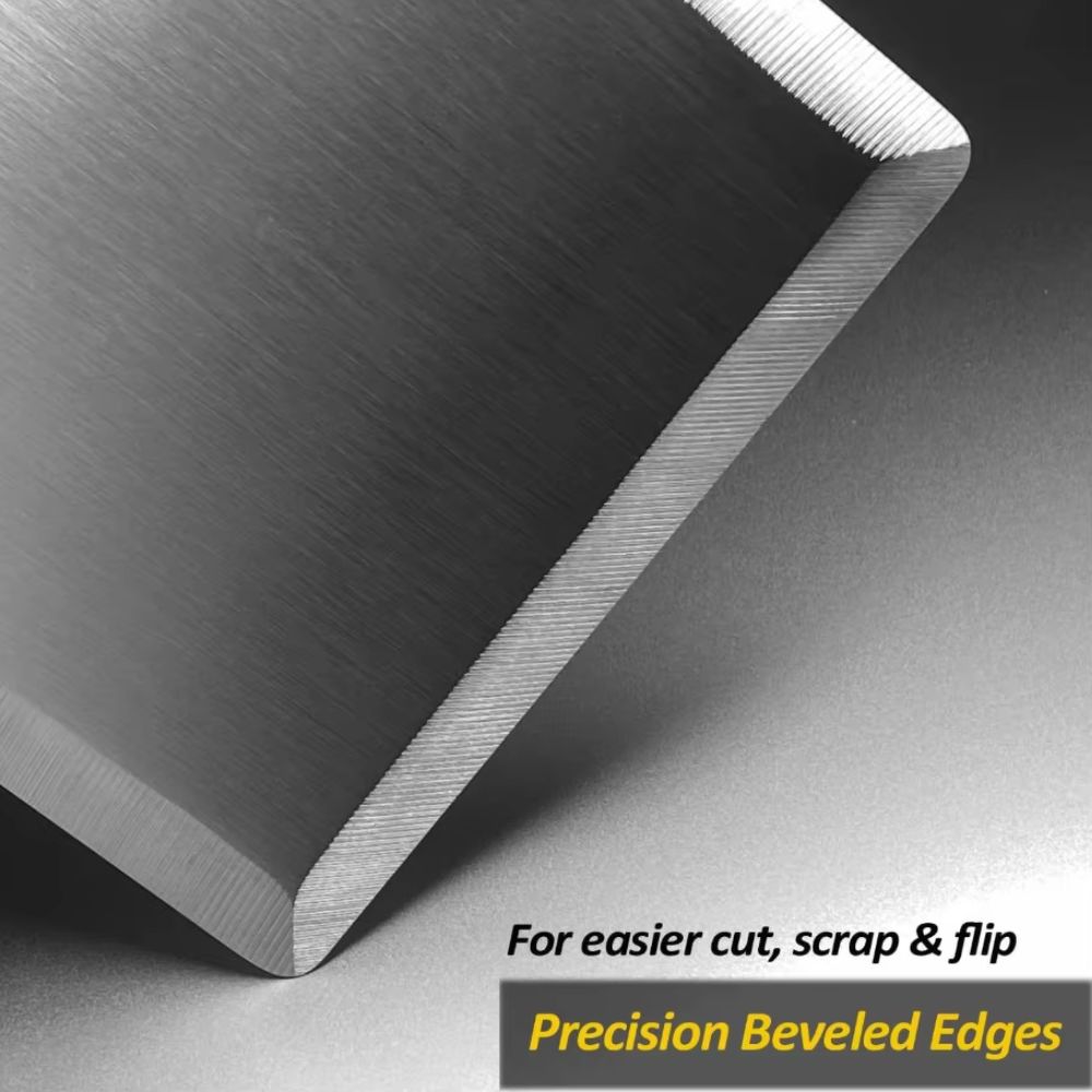 Close-up of stainless steel BBQ spatula showing precision beveled edge for easier cutting, scraping, and flipping.