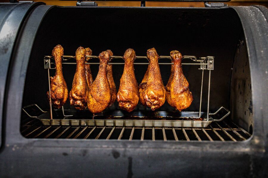 Chicken drumstick rack cooking chicken drumsticks evenly inside an offset smoker