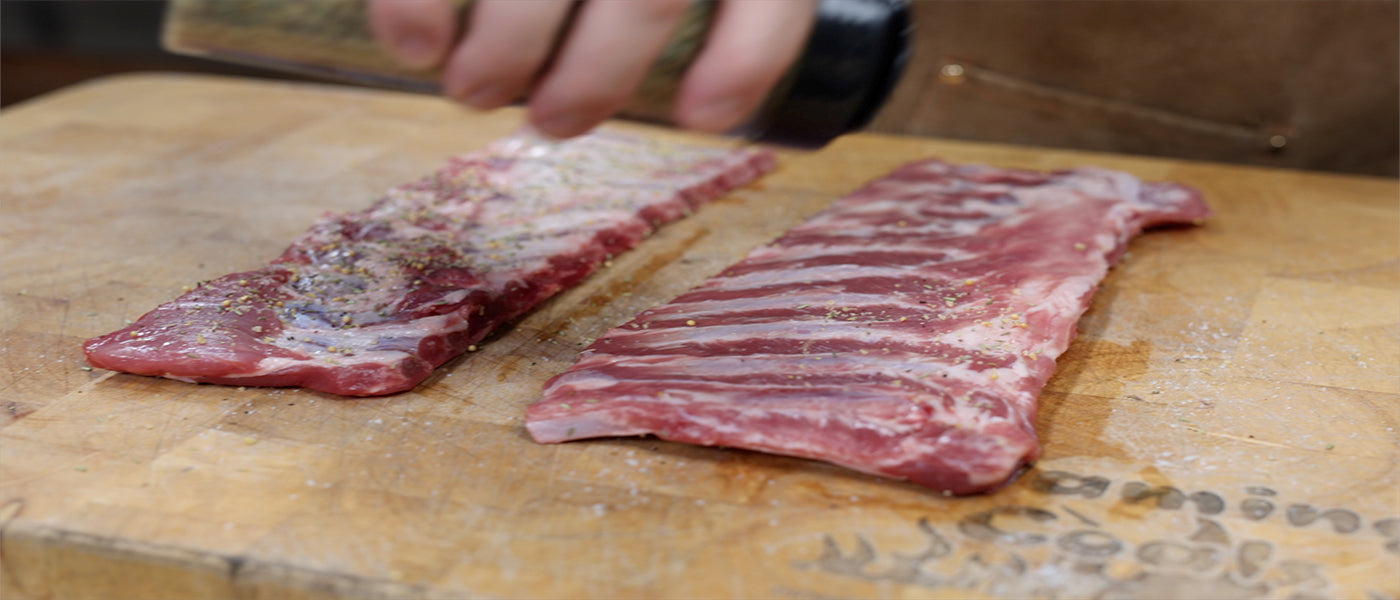 This image shows the pork ribs seasoned with Flaming coals Traditional Lamb Rub