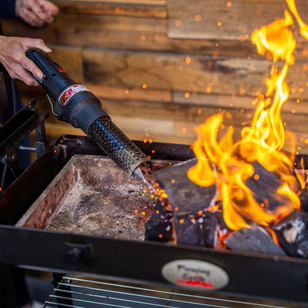 This image shows lit lump charcoal 