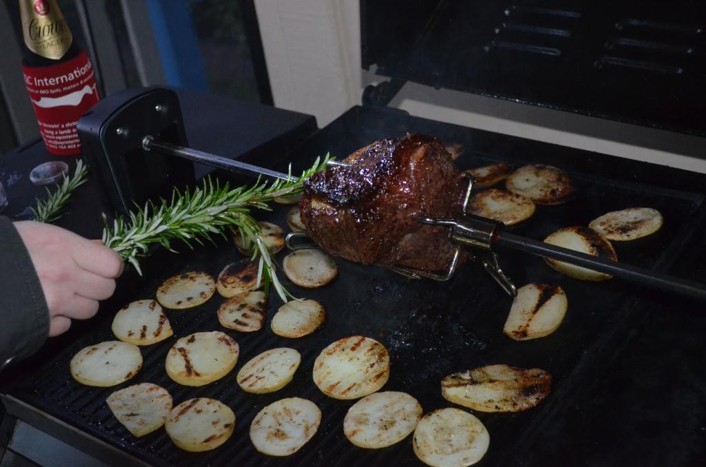 This image shows a spit being booked on a gas bbq
