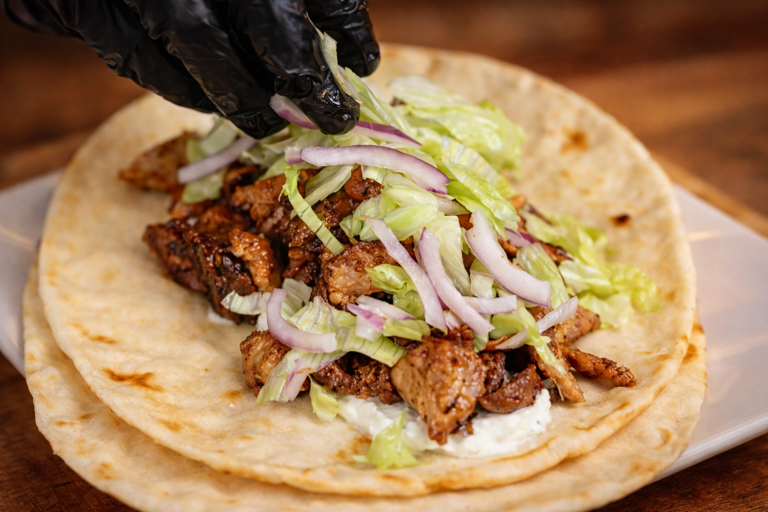 This shows greek wrap with leftover lamb