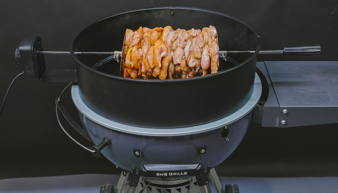 This image shows a gyros cooked on 57 cm weber bbq on a kettle rotisserie kit