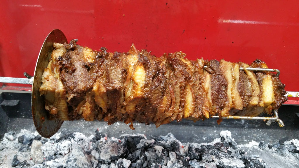 Chicken and lamb gyros Cooked on a BBQ Spit
