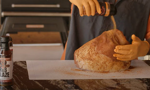 This_image_shows_Ham_being_seasoned_with_kosmos_Q_dirty_bir_rub