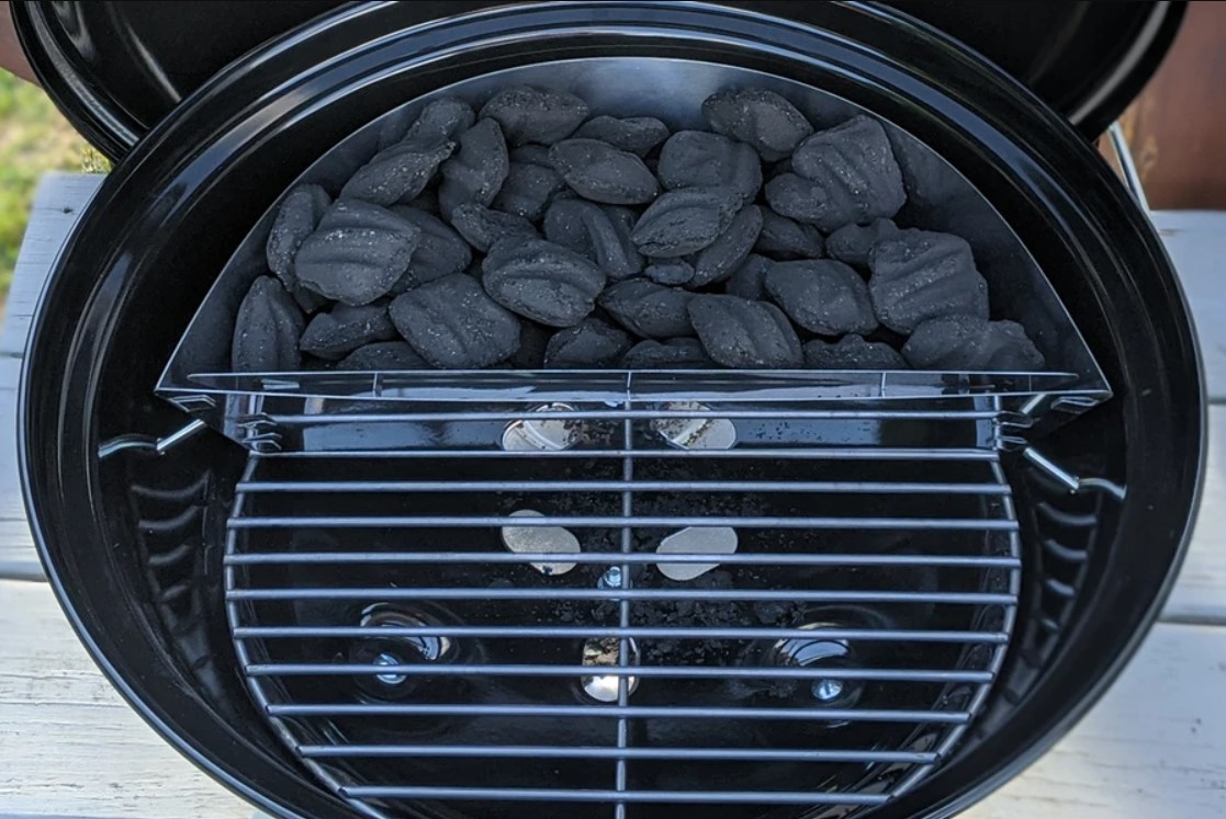 This image shows a charcoal loaded High_Quality_Slow_n_Sear_Charcoal_Basket