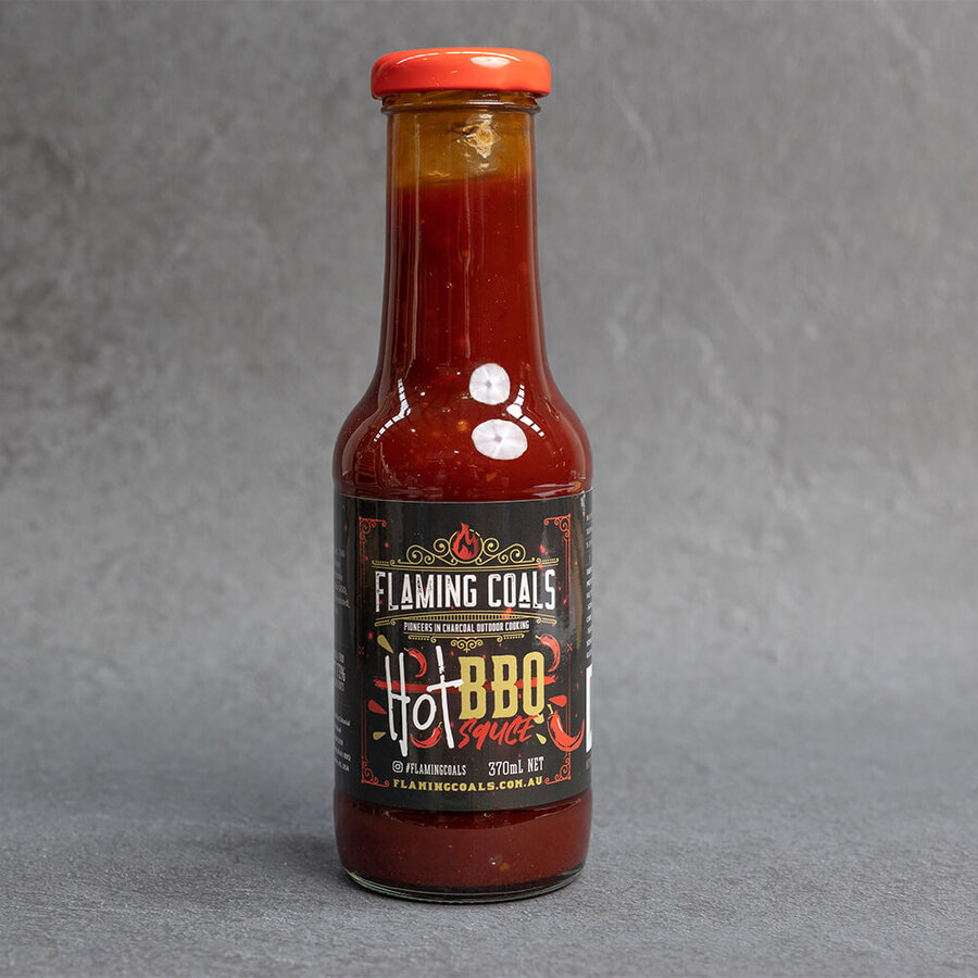 This_image_shows_flaming_coals_hot_bbq_sauce