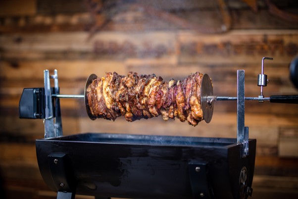 This image shows gyros being cooked on the Jumbuck Mini Spit Roaster