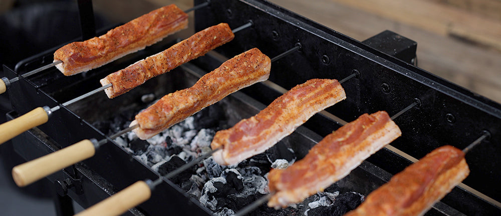 This image shows crispy pork belly cooked in Cyprus spit