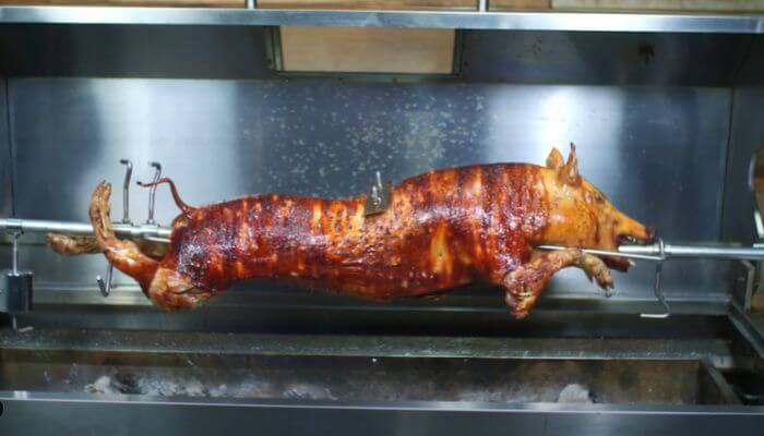 How Long Does It Take to Cook a Whole Pig on a Spit Roaster?