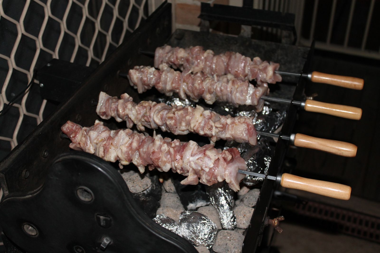 Chicken skewers cooking on a Cyprus Spit Roaster
