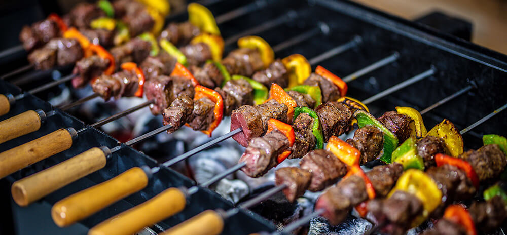 This image shows kebab cooked on a Cyprus Spit Roaster