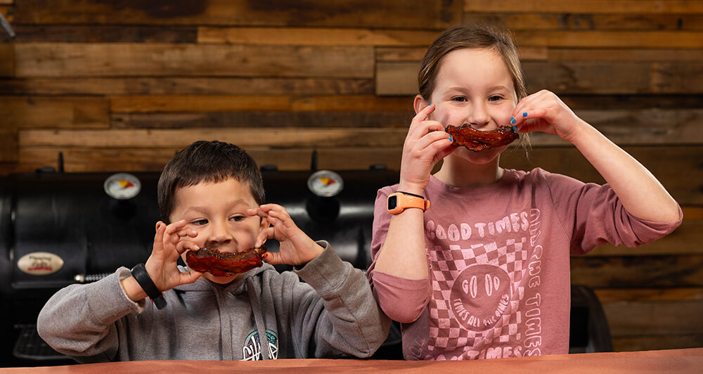 This_image_shows_kids_enjoying_the_beef_short_ribs