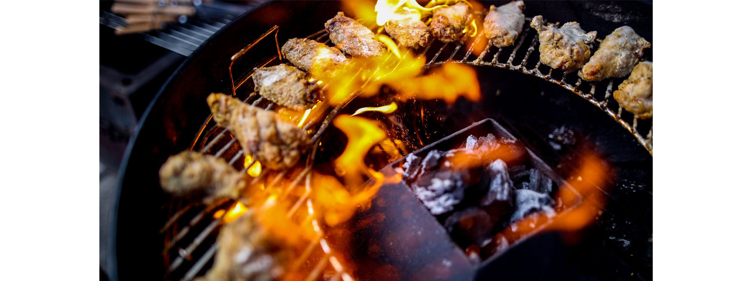 This image shows chicken wings cooked on weber kettle 