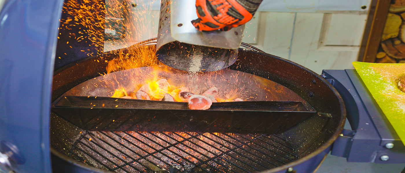 This image shows lit briquettes poured in SNS charcoal basket