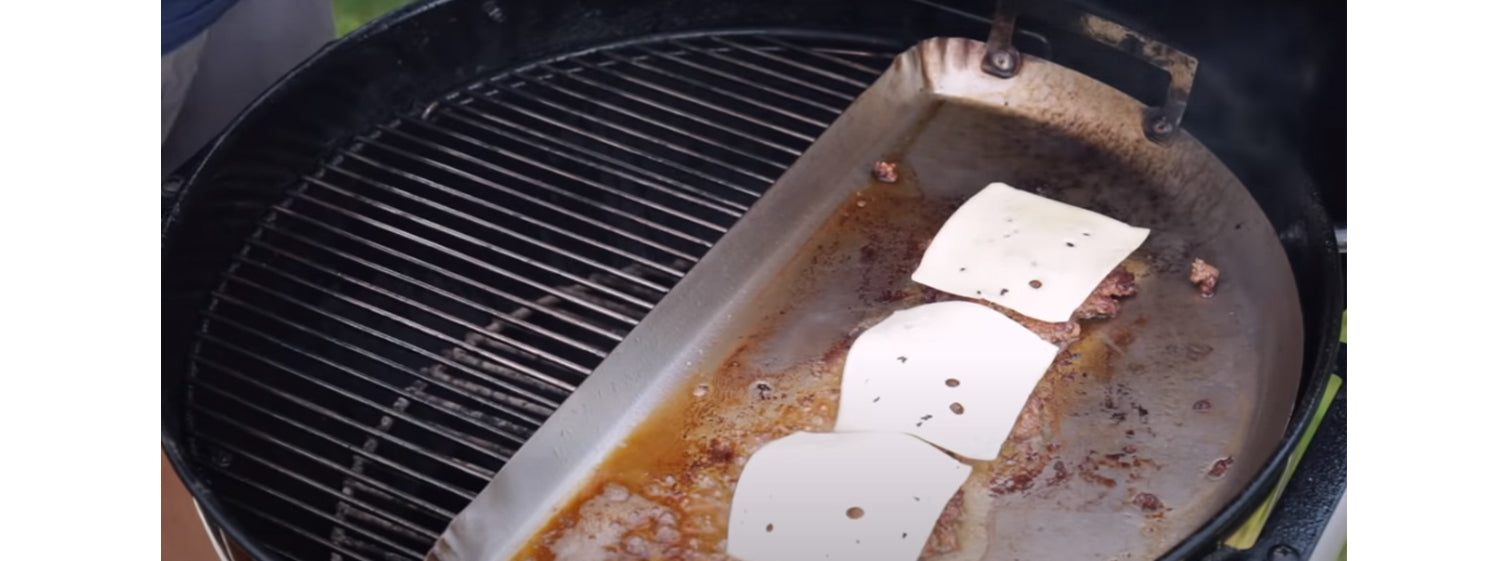 This image shows three meat with cheese on top on Drip 'n griddle pan