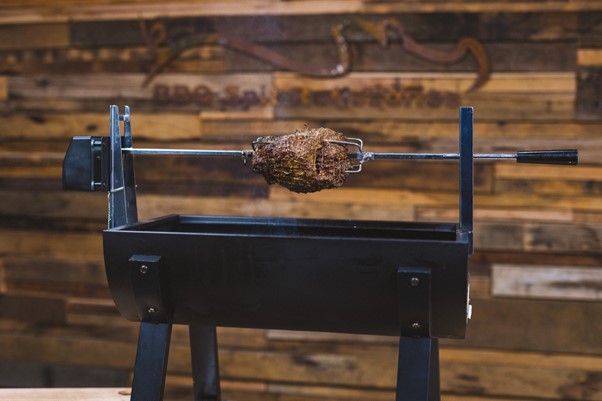 This image shows Lamb Shoulder being cooked in the Jumbuck Mini Spit