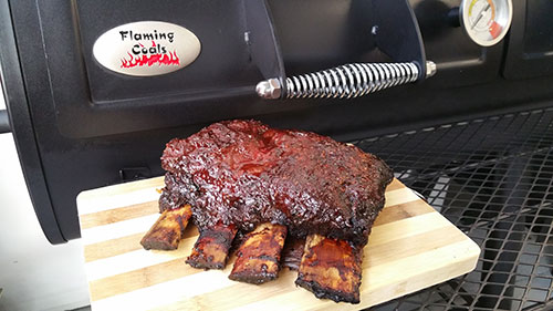 This picture shows Beef Ribs cooked in an Offset Meat Smoker