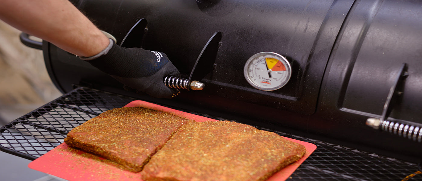 This image shows the Beef short ribs and Flaming Coals Offset Smoker