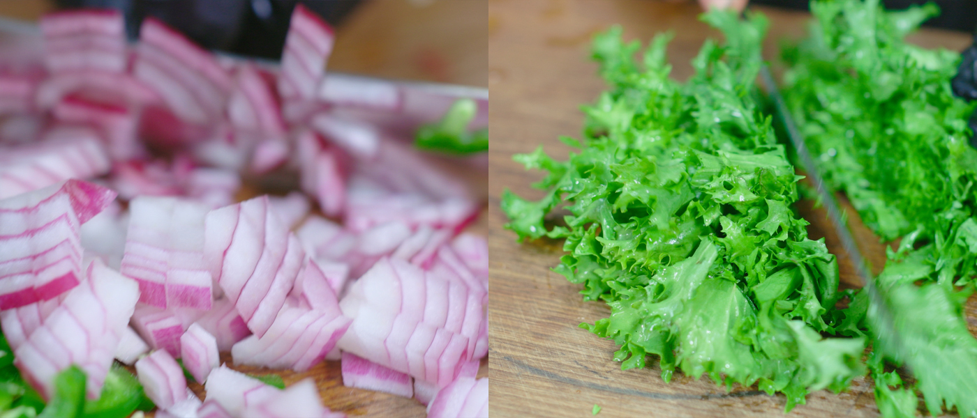 This image shows sliced onions and lettuce